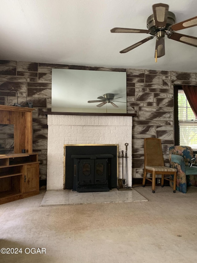 living area featuring a fireplace