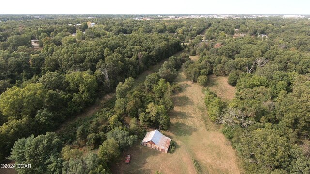 drone / aerial view with a forest view