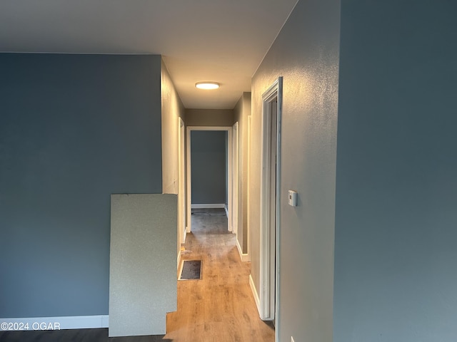 hallway featuring light hardwood / wood-style floors