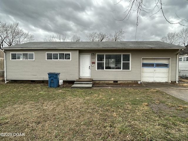 ranch-style house featuring a garage, driveway, entry steps, crawl space, and a front lawn