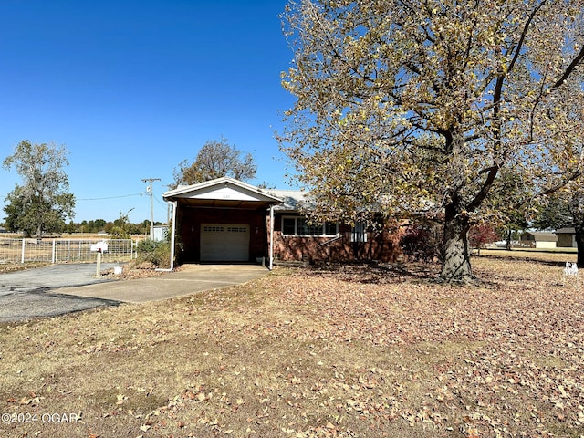 view of front of property with a garage