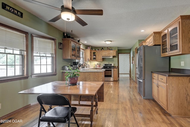 9825 County Rd 215, Webb City, MO 64870 - dining room featuring baseboards, light wood-style flooring, ceiling fan, and recessed lighting