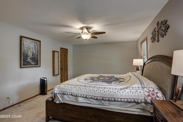 9825 County Rd 215, Webb City, MO 64870 - bedroom featuring light colored carpet, baseboards, and ceiling fan
