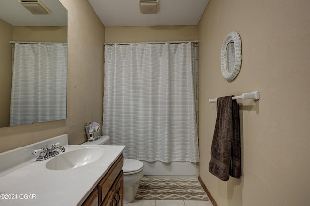 9825 County Rd 215, Webb City, MO 64870 - bathroom featuring vanity, tile patterned flooring, toilet, and shower / bath combination with curtain