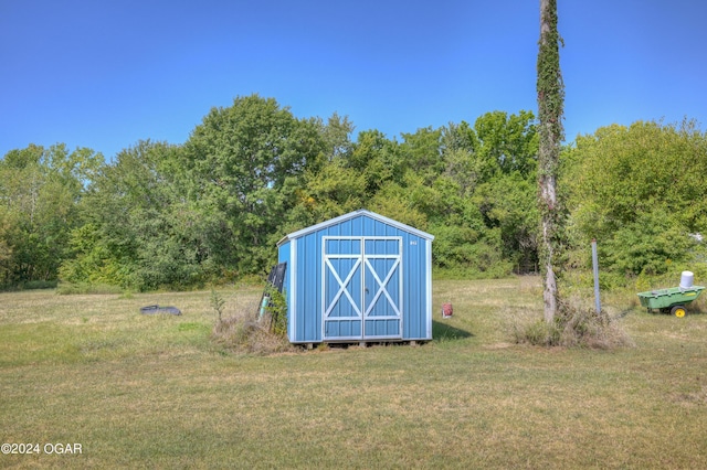9825 County Rd 215, Webb City, MO 64870 - view of shed with a view of trees