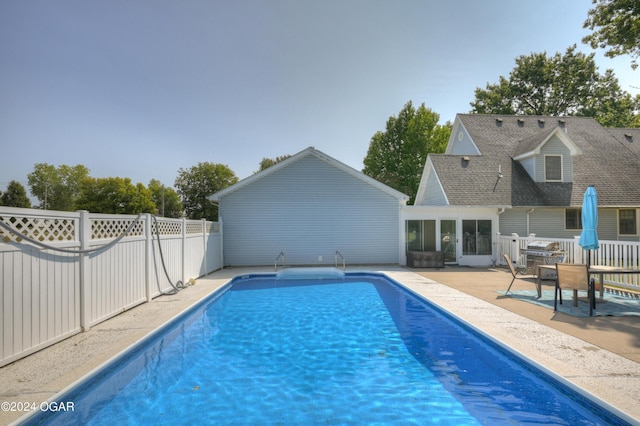 9825 County Rd 215, Webb City, MO 64870 - view of swimming pool with a patio and a sunroom