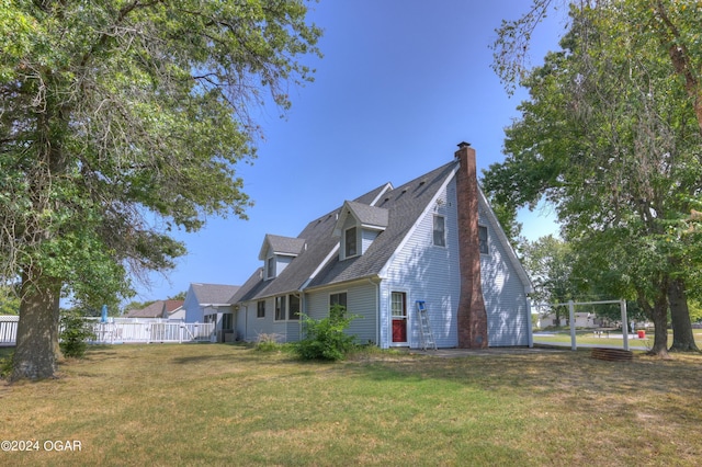 9825 County Rd 215, Webb City, MO 64870 - view of side of home featuring a chimney and roof with shingles