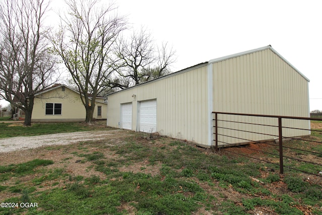 view of outbuilding with a garage