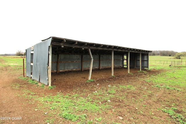 view of outbuilding featuring a rural view