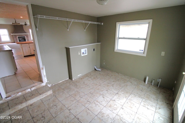 clothes washing area featuring washer hookup and hookup for an electric dryer