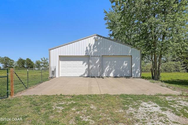 garage with a yard