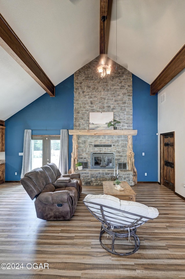 living room with beam ceiling, a fireplace, high vaulted ceiling, hardwood / wood-style floors, and french doors