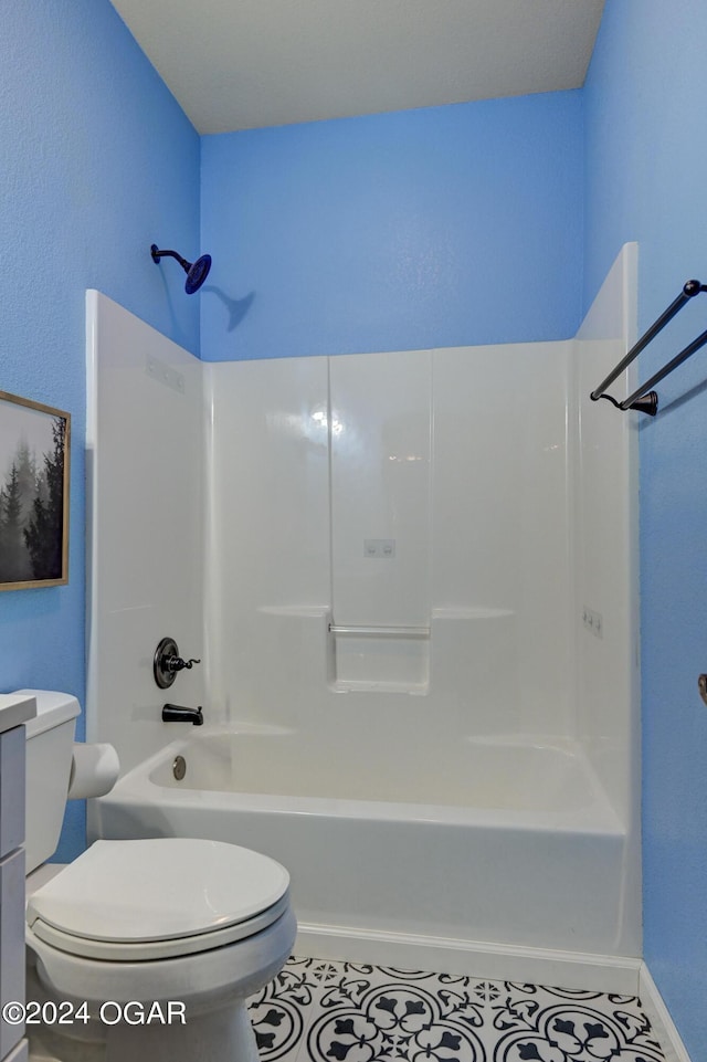 full bathroom with tile patterned flooring, vanity, toilet, and shower / bath combination