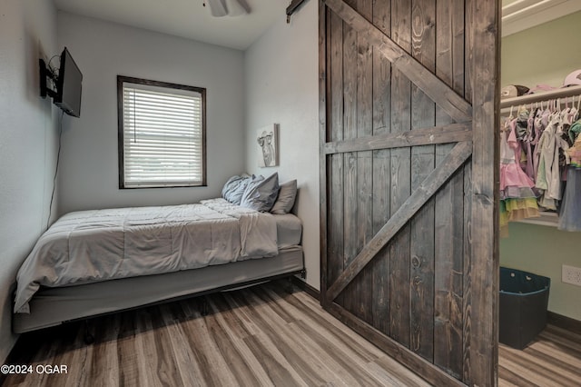 bedroom with light wood-type flooring