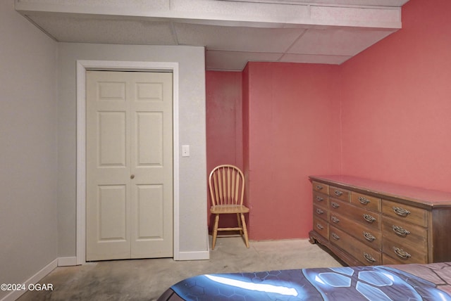 carpeted bedroom featuring a closet