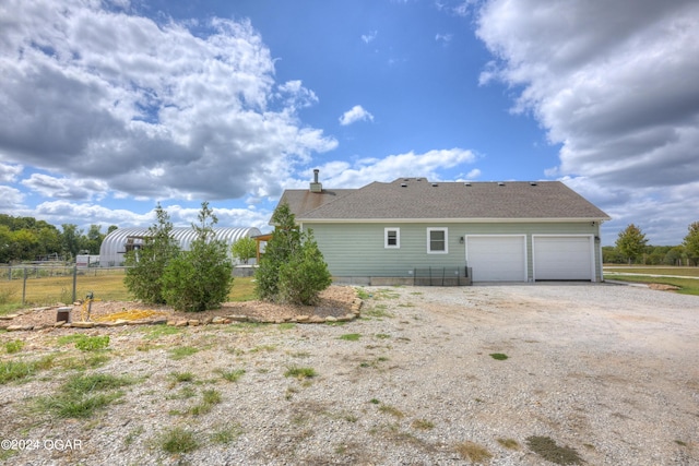 view of home's exterior with a garage