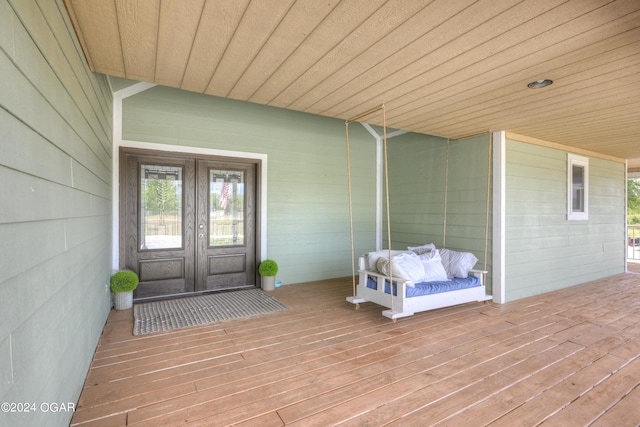 doorway to property with a wooden deck