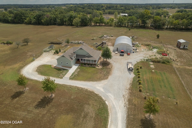 birds eye view of property featuring a rural view