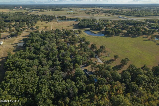 bird's eye view with a rural view and a water view