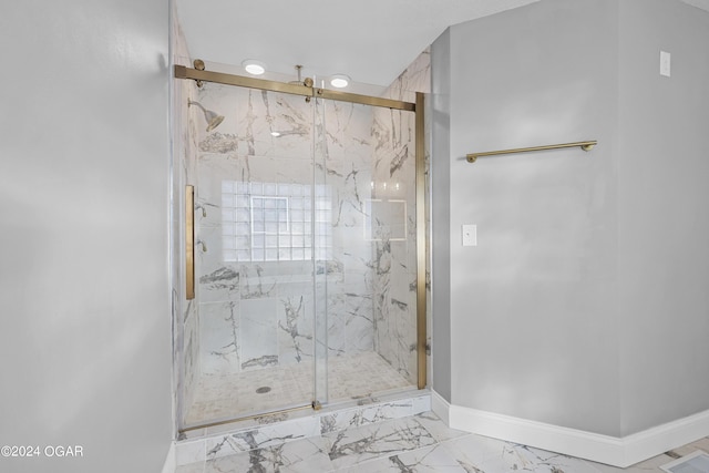 bathroom featuring an enclosed shower