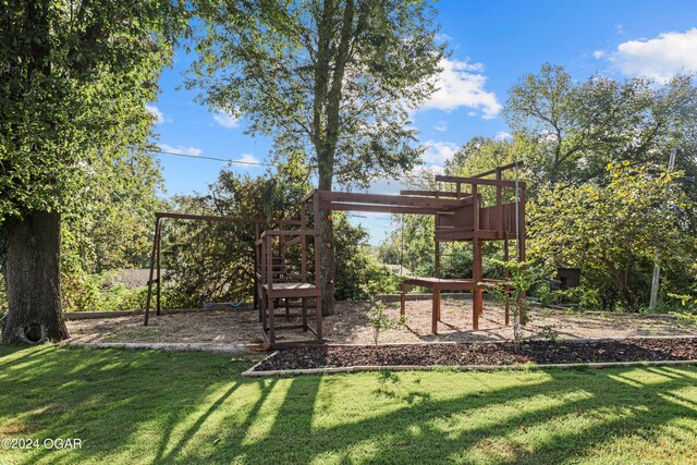 view of yard with a playground