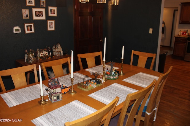 dining room with dark hardwood / wood-style floors