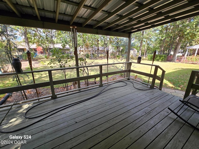 wooden deck with a yard