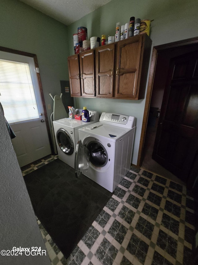 107 Foursome Ln, Carl Junction, MO 64834 - washroom featuring cabinet space, independent washer and dryer, and a textured ceiling