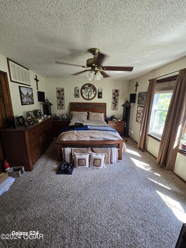 107 Foursome Ln, Carl Junction, MO 64834 - carpeted bedroom with a textured ceiling and ceiling fan