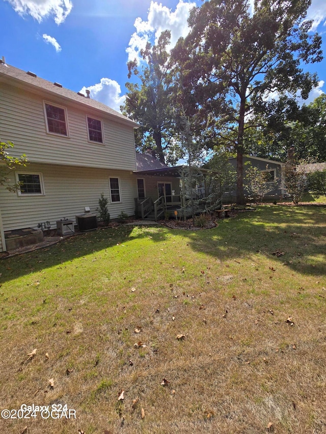 view of yard featuring central AC