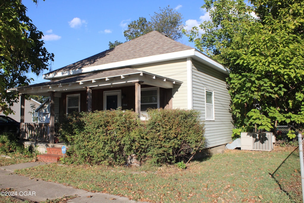 view of home's exterior featuring a yard