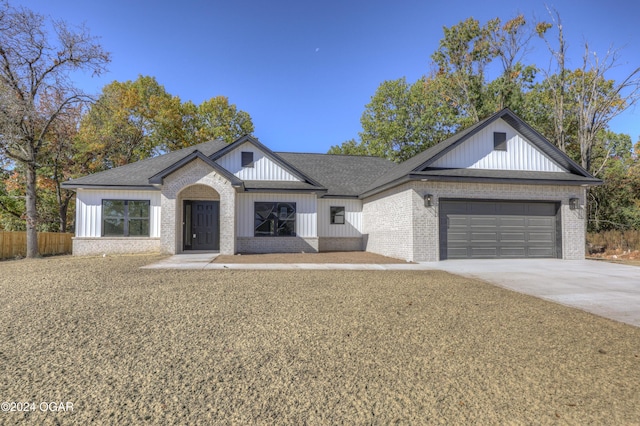 view of front of home with a garage