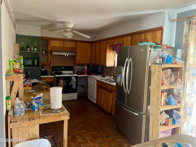 kitchen featuring white appliances, ceiling fan, exhaust hood, and sink