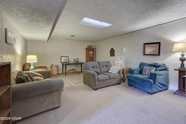 living room with a textured ceiling and light colored carpet