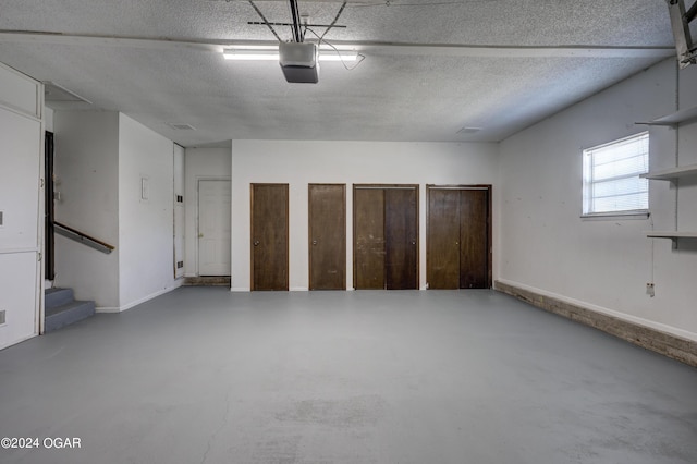 interior space featuring a textured ceiling and two closets