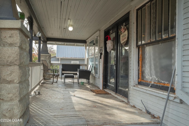 wooden deck featuring a porch