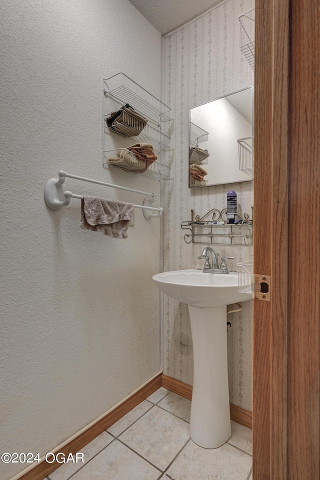 bathroom with tile patterned flooring