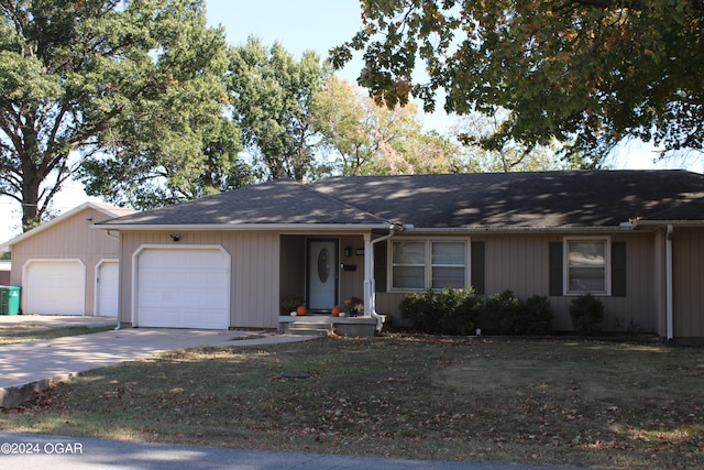 single story home featuring a garage