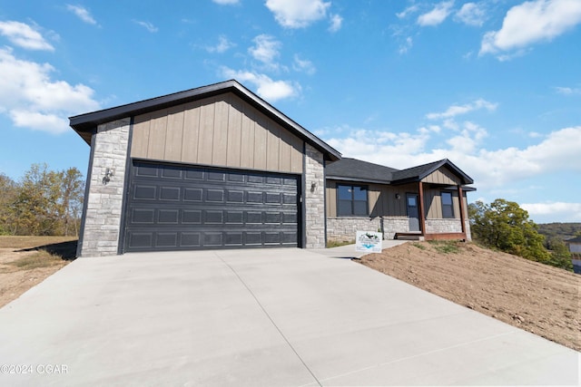 view of front of property with a garage