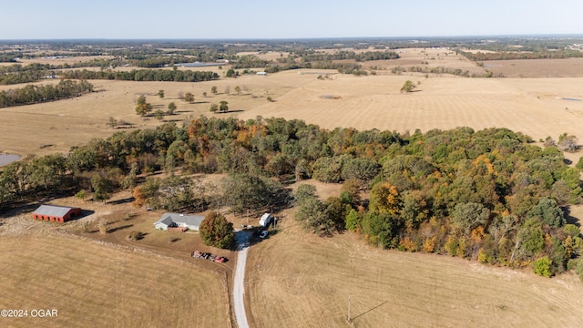 birds eye view of property featuring a rural view