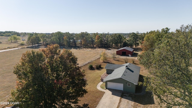 birds eye view of property featuring a rural view