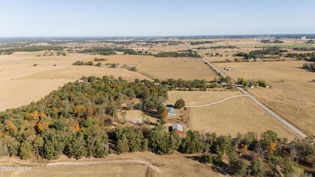 birds eye view of property featuring a rural view