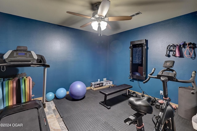 workout area featuring ceiling fan