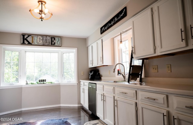 2652 S Farm Rd 51, Republic, MO 65738 - kitchen featuring dishwasher, light countertops, wood finished floors, and white cabinetry