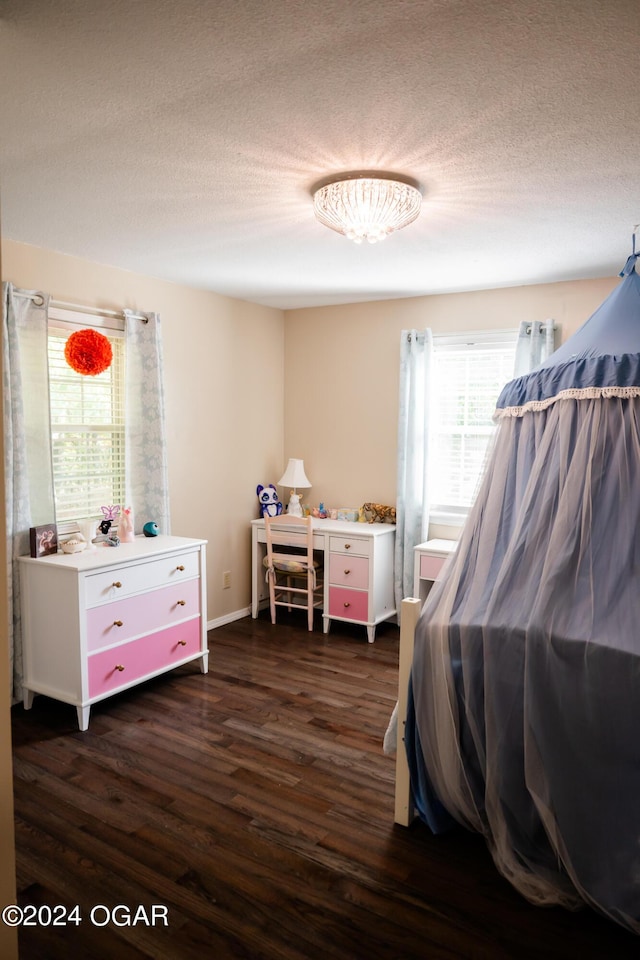 2652 S Farm Rd 51, Republic, MO 65738 - bedroom with dark wood finished floors and a textured ceiling