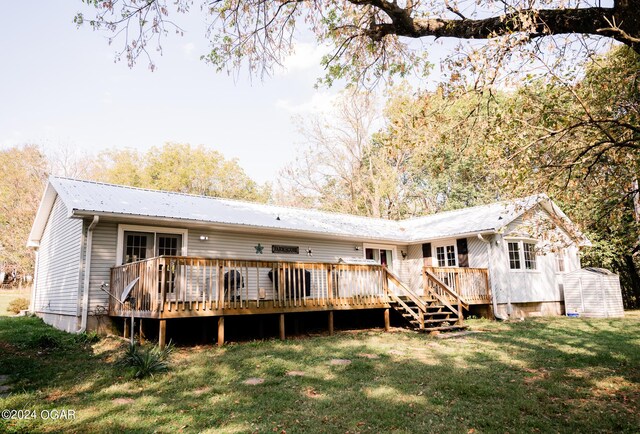 2652 S Farm Rd 51, Republic, MO 65738 - rear view of house with a yard, a deck, a metal roof, and crawl space