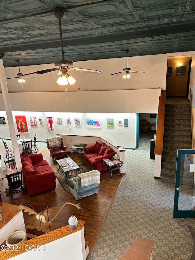 carpeted living room featuring vaulted ceiling