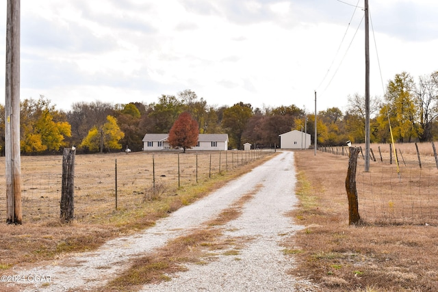 view of road featuring a rural view