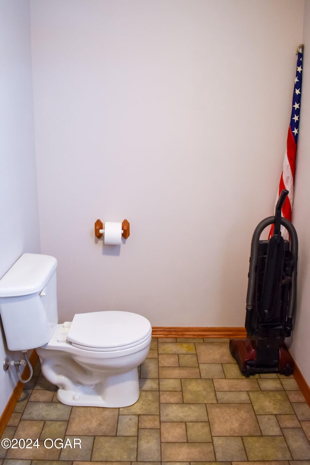 bathroom featuring toilet