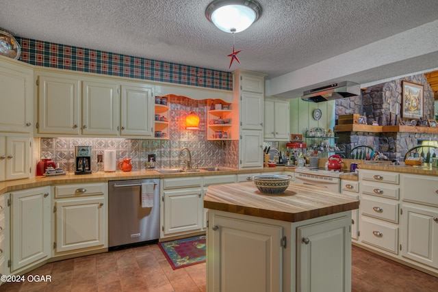 kitchen with a kitchen island, a textured ceiling, dishwasher, sink, and butcher block countertops